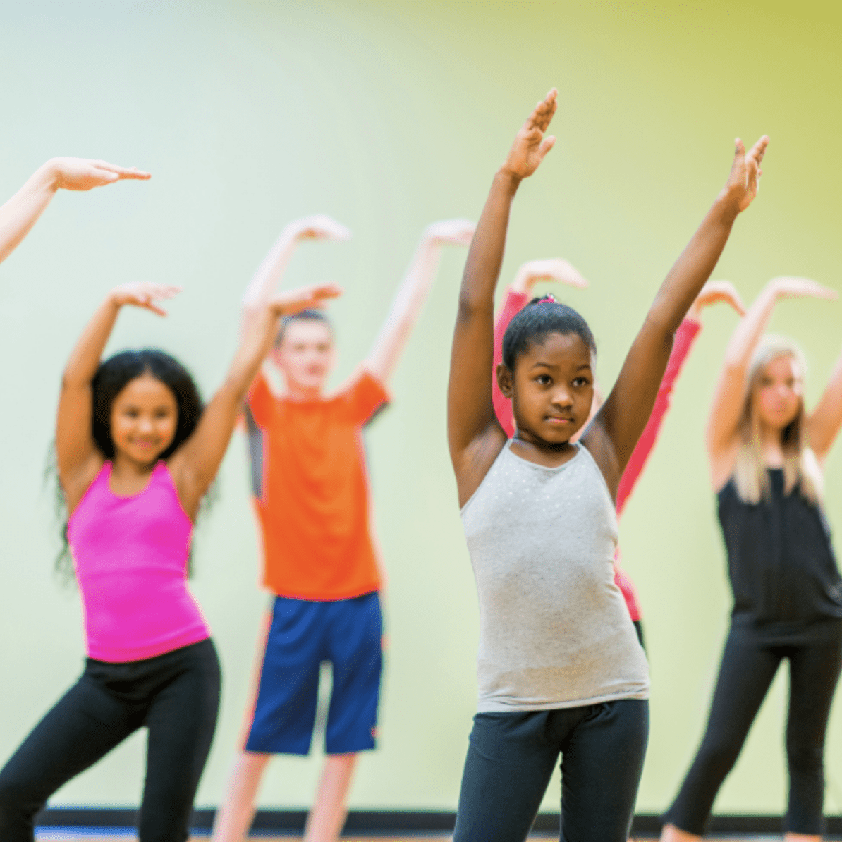 kids of all backgrounds dancing