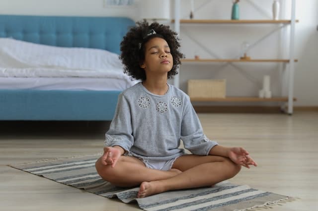 child meditating - mindfulness