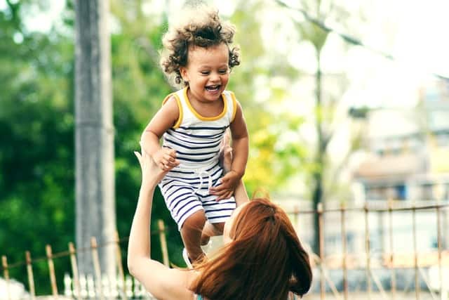 self-regulation developmental milestones - mom with baby