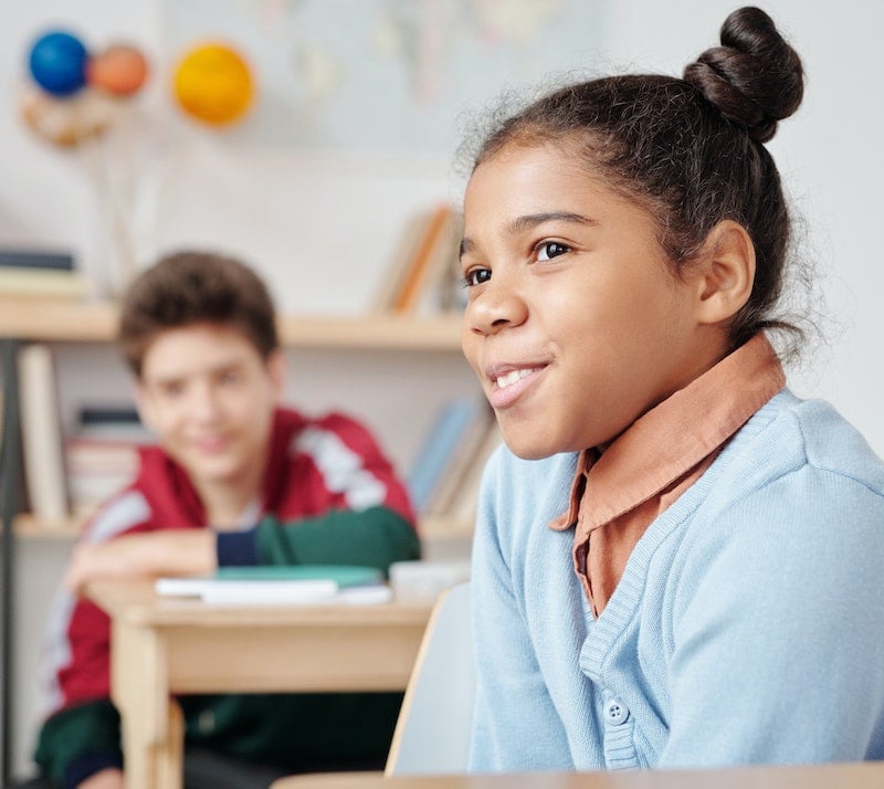 students listening to teacher