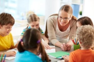 teacher listening to student