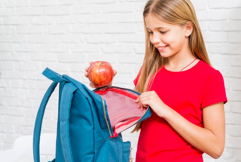 routines for kids - girl opening backpack